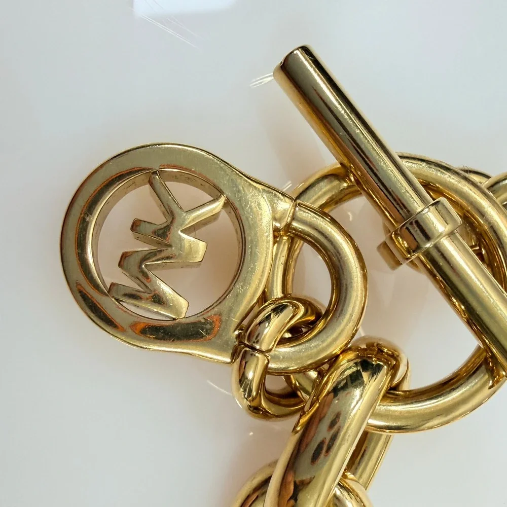 Michael Kors Gold Tone Chunky Chain Bracelet MK Logo Toggle Clasp 6.5